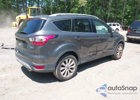 2017 Ford Escape Titanium z USA, uszkodzony, nr VIN 1FMCU9JD5HUD71601